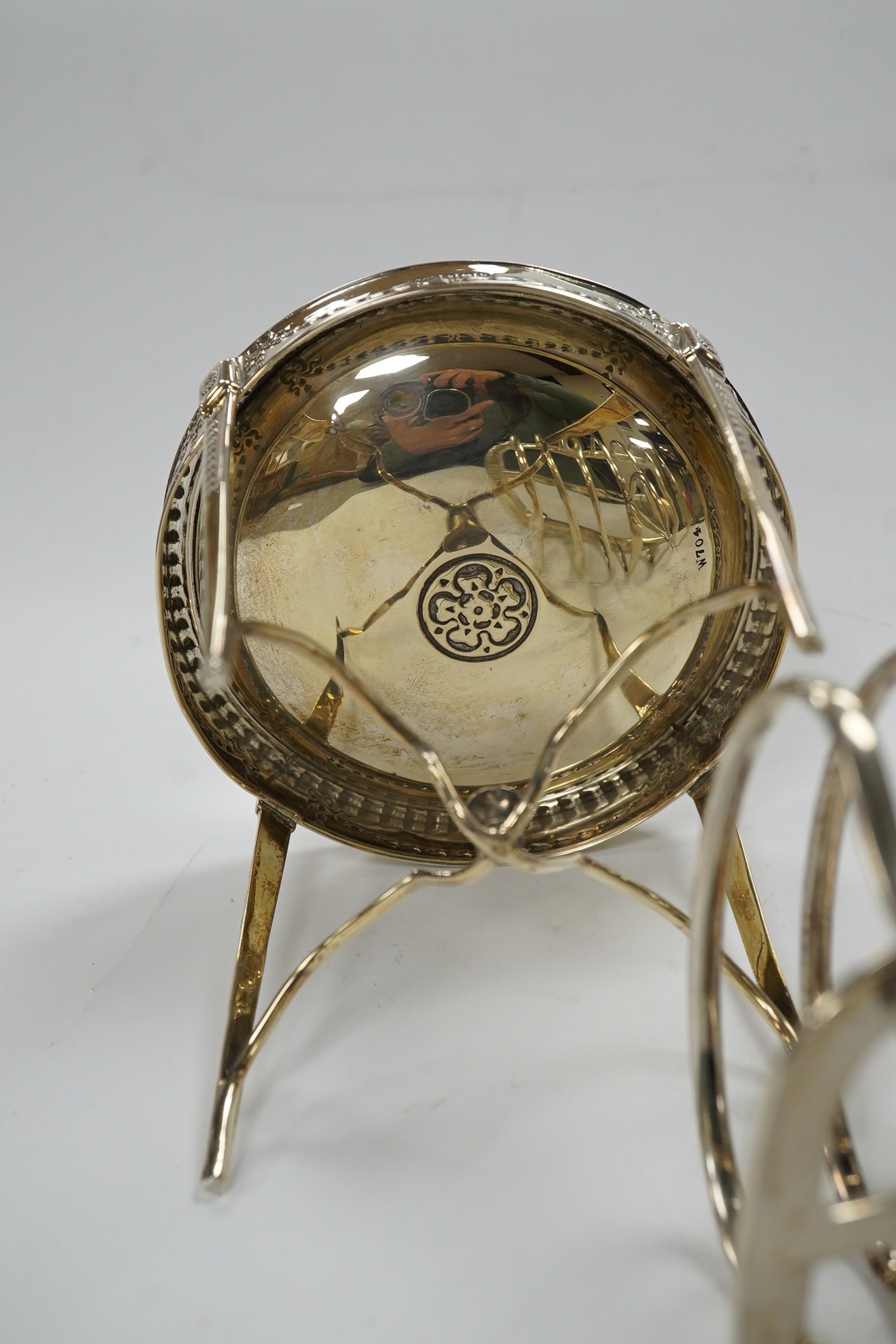 A George V miniature silver model of an occasional table, John Round, Sheffield, 1925, height 9.8cm, together with a similar silver five bar toast rack, 11.3oz. Condition - fair